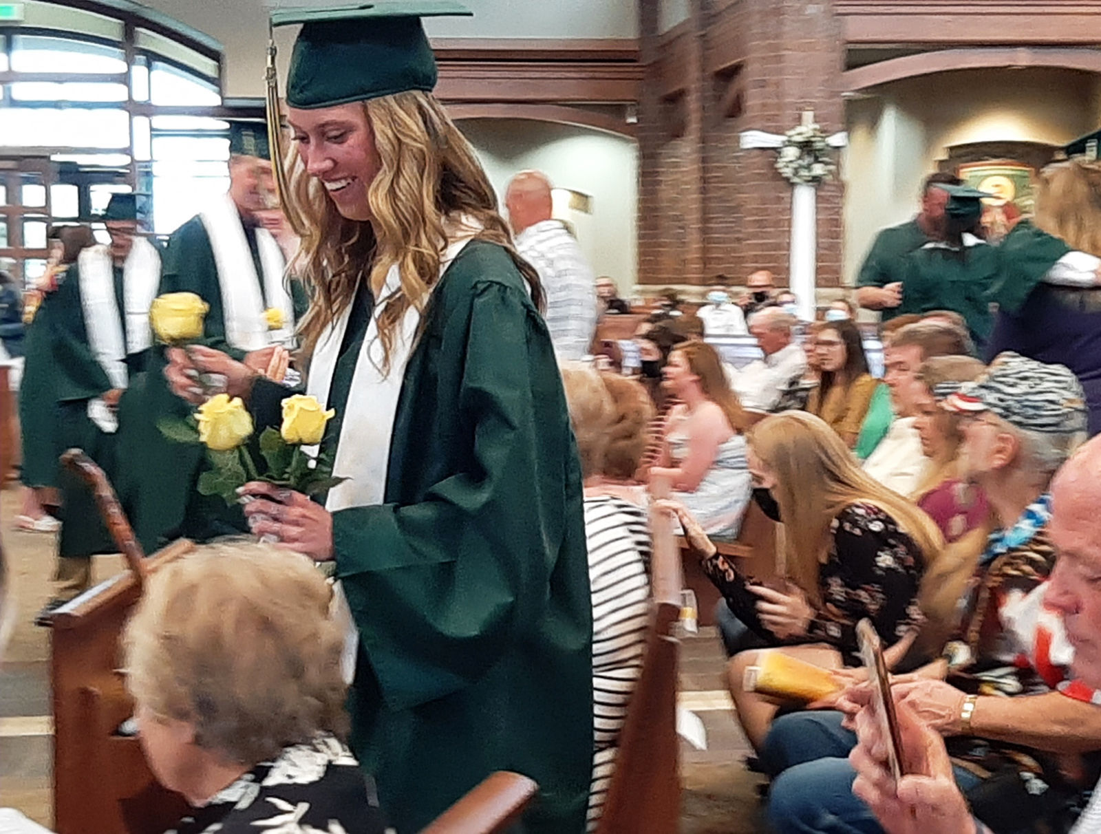 Senior with yellow roses